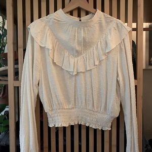 A medium off white blouse